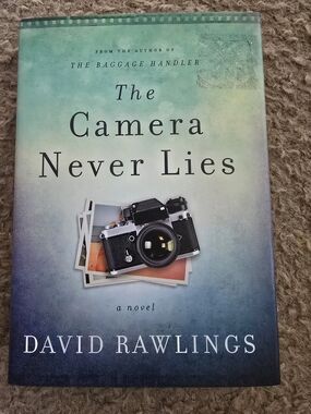 4/$12 The Camera Never Lies by David Rawlings - Teal to Blue Hardcover